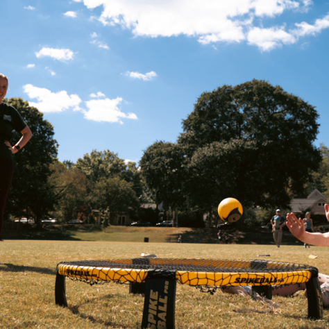 Boy playing game with a ball. 