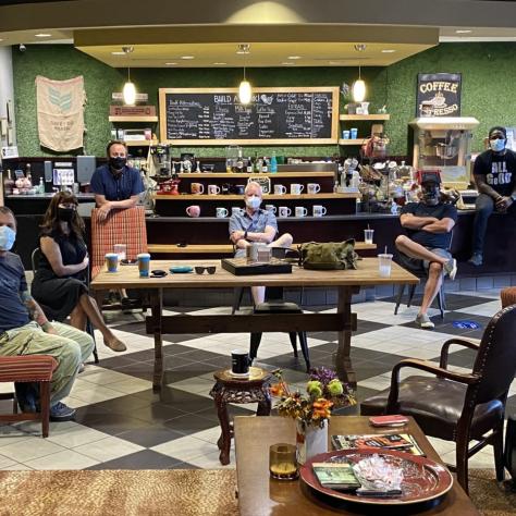 I call this: “Stills Wearing Masks” ¬– a safe visit from Local 600 photographers (L to R) Boris Martin, Eliza Morse, Erika Doss, Daniel McFadden, Bob Mahoney, Frank Masi, Eli Adé, Mark Hill.